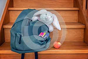 School bag with cuddly toy, supplies and lunch