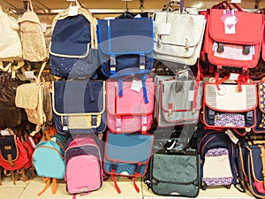 School bags in a supermarket, back to school concept photo