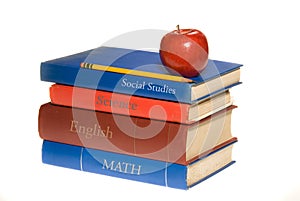 School books and apple