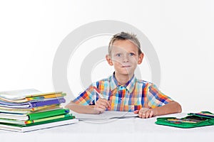 School boy is doing his homework