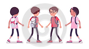 School boy, girl in casual wear walking