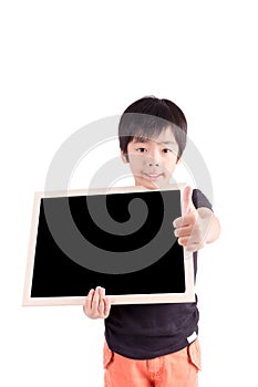 school boy holding a blank black board, isolated on white background