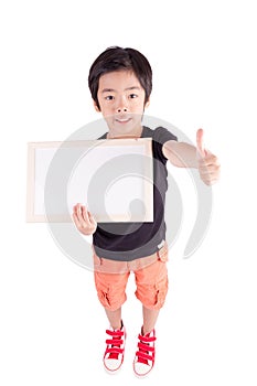 School boy holding a blank whiteboard