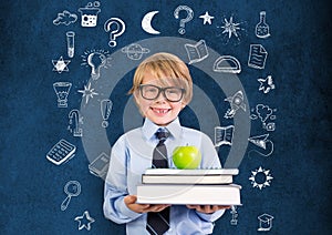 School boy holding books and Education drawing on blackboard for school