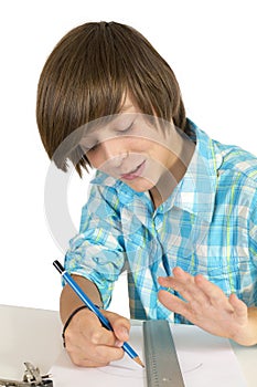 School boy with pencil and ruler, isolated on white