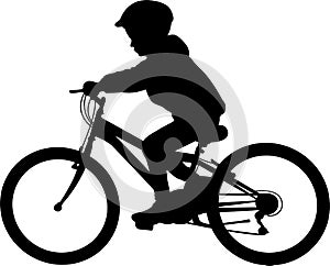 School boy riding MTB silhouette