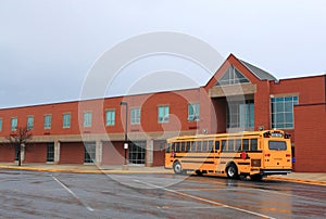 School Building with Bus