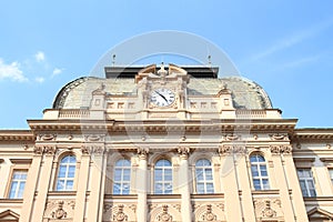 School building with clocks