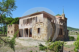 School building in Colonia Guell, Spain photo