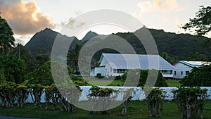 A school building in Rarotonga with the Emerald Mountains in the background