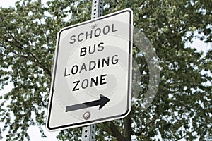 school bus loading zone vertical rectangle sign with arrow pointing right