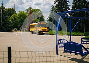 School bus parked by the school in Ukraine.