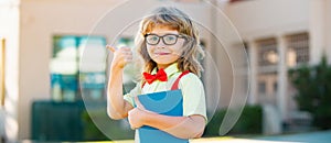 School child boy at school. Schoolboy going back to school. Kids education concept.