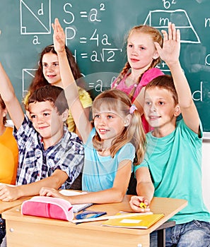 School child sitting in classroom.