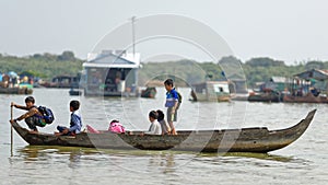 School children in boat, Tonle Sap, Cambodia