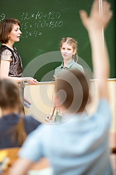 School children in classroom at math lesson