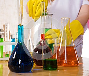 School children doing chemistry science experiment