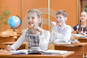 School children at lesson in classroom