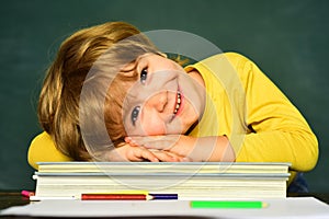 School children. Little student boy happy with an excellent mark. September 1. Elementary school and education.