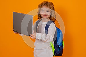 School children. School child using laptop. Kid boy from elementary school with pc. Little student, smart nerd pupil