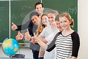 School class teacher motivating students photo