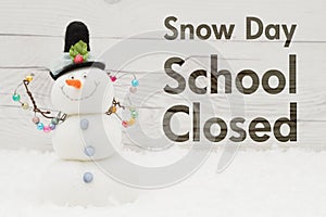 School Closed message with a snowman