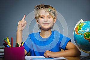 School concept. Closeup gestured child, boy found idea or solution photo