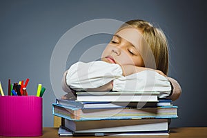 School concept. Closeup portrait girl asleep on pile of books