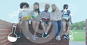School concept icons against group of students wearing face mask reading books sitting on brick wall