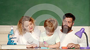 School concept. Parent taking child to school. Family school partnership. Home Family math schooling - Parents teaching