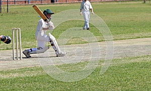 School cricket boy playing pull shot