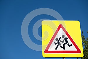 School crossing sign, roadsign with warning for crossing children