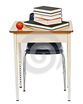 School desk and chair with books and apple isolated on white.