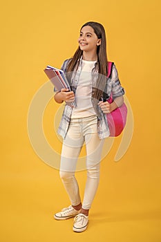school education for teen girl. teen girl student with backpack. study well to get knowledge. learning school lessons