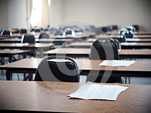 School empty cold exam class room desk and chair photo