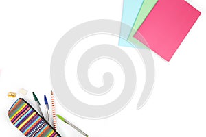 School equipment, pencil case & text Books on a white background