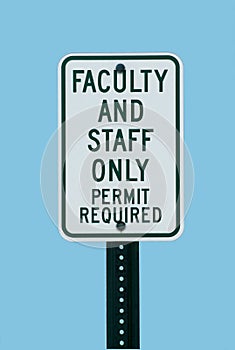 School faculty parking sign