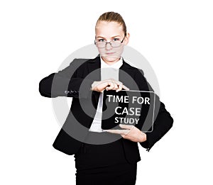 School girl in a business suit holds a pc tablet in his hands with inscription - time for case study