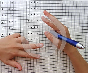 School girl learning maths with fingers