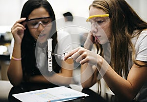 School girl learning science classroom