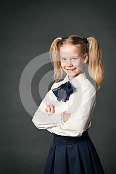 School Girl over Blackboard Background, Happy Child Portrait