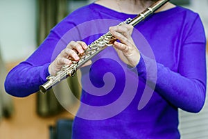 School girl with transversal flute