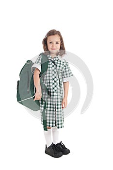 School girl in uniform with bag