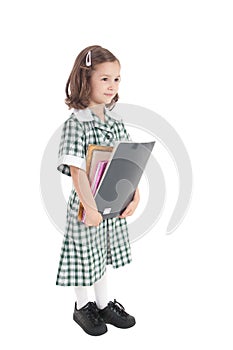 School girl in uniform with books