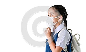 School Girl wearing mouth mask against air smog pollution on white background with clipping path