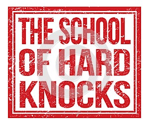 THE SCHOOL OF HARD KNOCKS, text on red grungy stamp sign