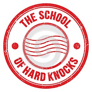 THE SCHOOL OF HARD KNOCKS text on red round postal stamp sign