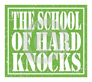 THE SCHOOL OF HARD KNOCKS, text written on green stamp sign