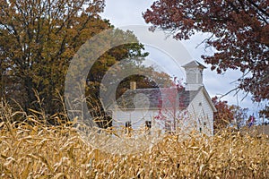 School house, autumn corn field photo