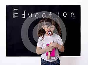 School kid holding supplies